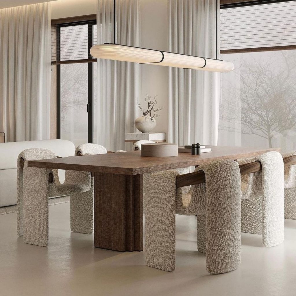 Uma sala de jantar onde o design de itneriores conseguiu elevar o espaçocom um toque contemporaneo