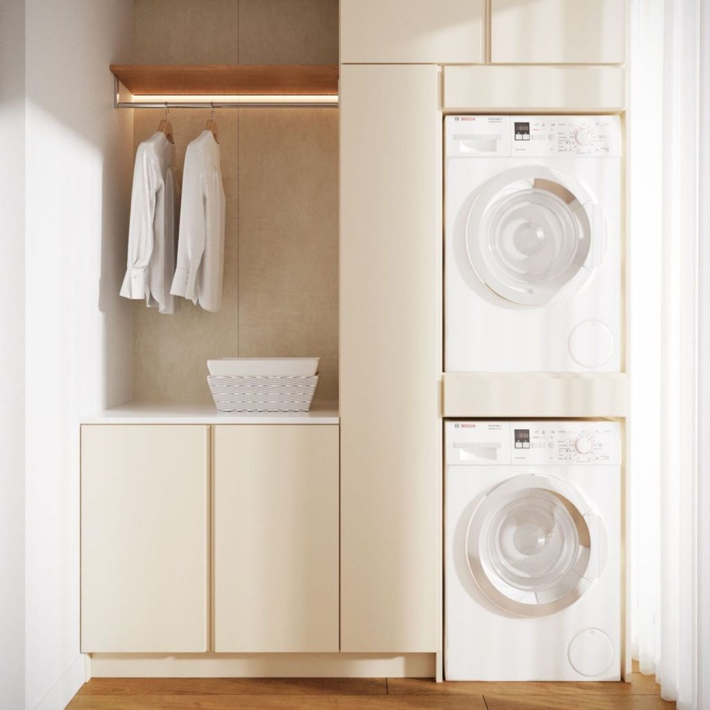Máquinas de lavar e secar incluídas na decoração de lavanderia.
