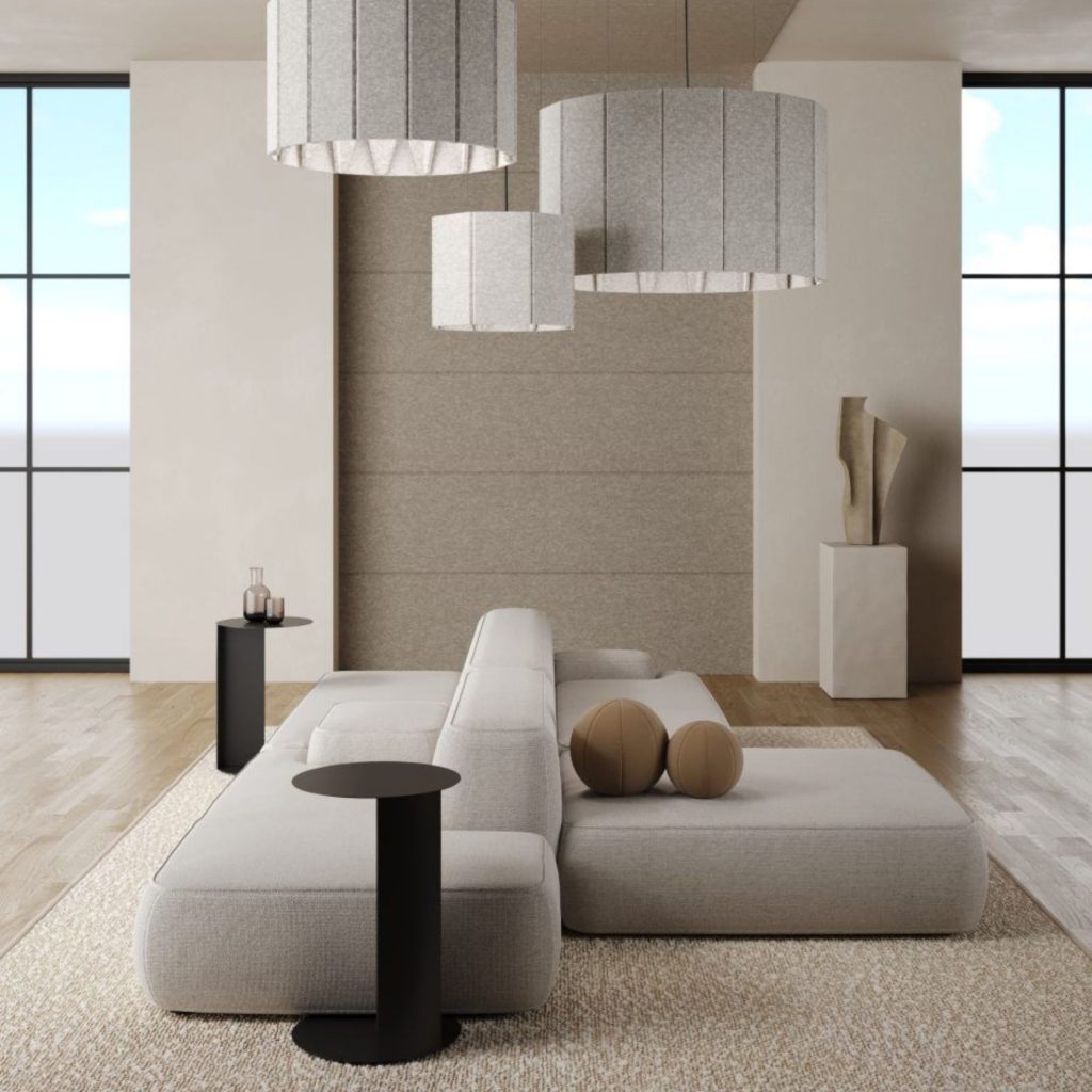 Sala contemporânea onde a decoração minimalista cria um ambiente equilibrado que desperta emoções de serenidade e conforto. A composição entre sofá, mesas circulares e luz natural evidencia a intenção da arquitetura em organizar o espaço através de ritmo e proporção. Cada elemento reforça uma decoração que privilegia simplicidade e textura, permitindo que as emoções se revelem de forma subtil. A presença das peças escultóricas e da luz suave traduz uma abordagem de arquitetura sensorial, onde a coerência visual sustenta a ligação entre espaço e bem‑estar, e onde as emoções se alinham com a intenção da arquitetura.