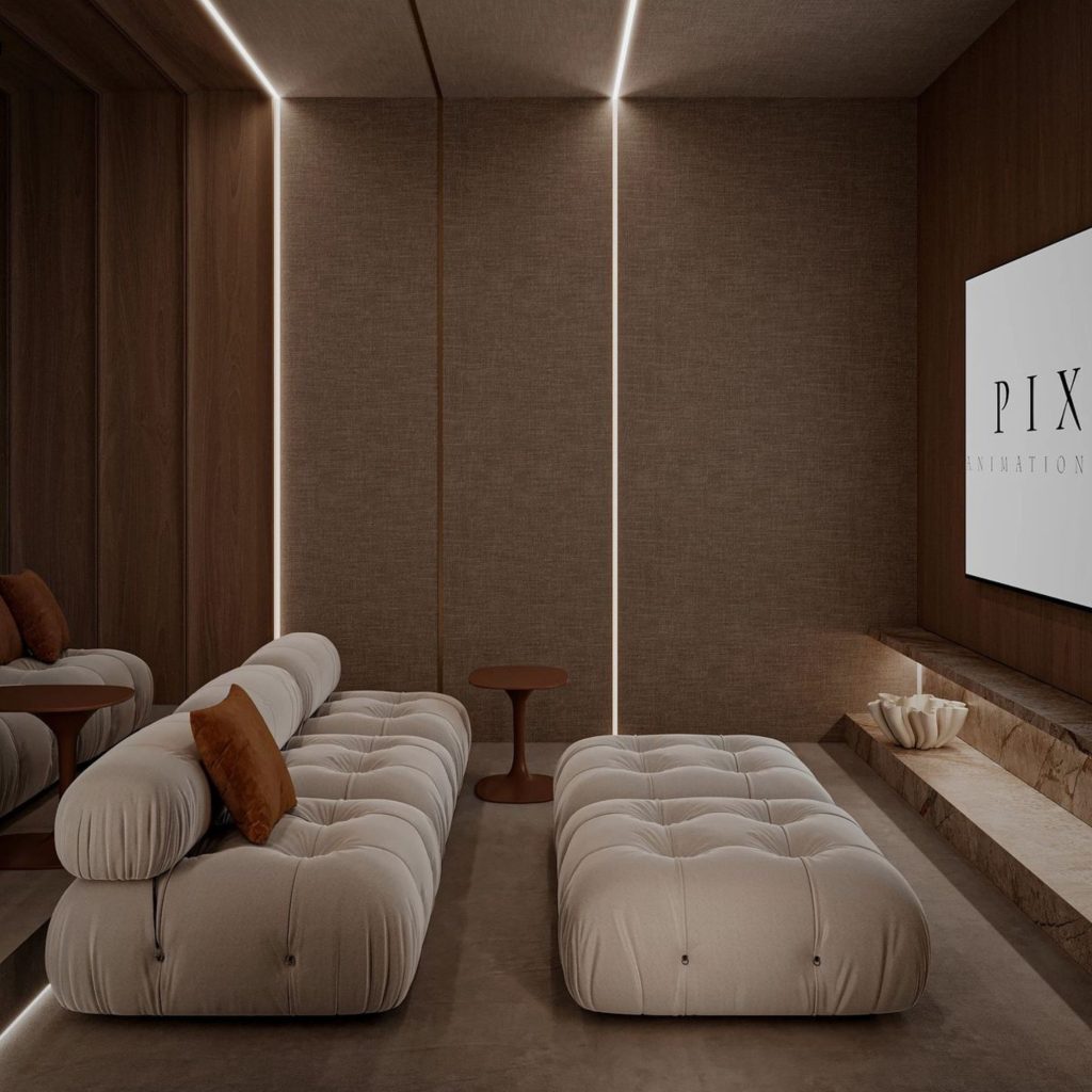 Uma sala de cinema doméstica onde os paineis acústicos integrados nas paredes controlam o som e reduzem fenómenos acústicos, criando uma insonorização acústica adequada à imersão visual. A iluminação suave destaca como os paineis acústicos estabilizam o som e mitigam fenómenos acústicos, enquanto a presença discreta de espuma acústica reforça a insonorização acústica sem interferir na estética. O ambiente mostra como paineis acústicos e espuma acústica trabalham em conjunto para equilibrar o som, minimizar fenómenos acústicos e garantir uma insonorização acústica eficaz típica de salas de cinema.