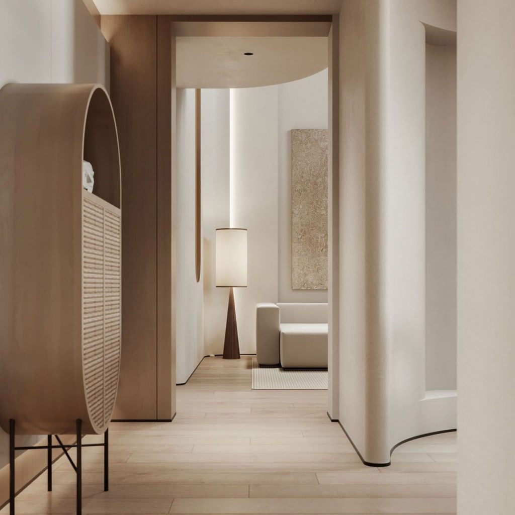 Ambiente sereno onde a arquitetura orgânica surge em linhas suaves e volumes contínuos, criando uma casa que privilegia o bem‑estar através de um design de interiores equilibrado. A madeira clara e as texturas naturais reforçam o design biofílico, integrando‑o de forma subtil na arquitetura orgânica para potenciar o bem‑estar. Cada peça, do candeeiro escultural ao mobiliário curvo, traduz um design de interiores pensado para que a casa respire calma, unindo design biofílico, arquitetura orgânica e bem‑estar numa composição harmoniosa.